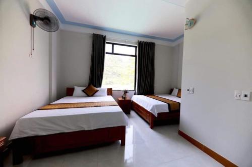 Phong Nha Riverview Homeにあるベッド