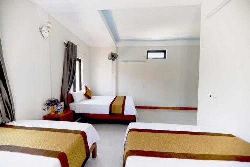 Phong Nha Riverview Homeにあるベッド
