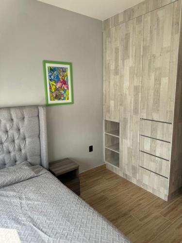 Postel nebo postele na pokoji v ubytování Dpto Anahuac