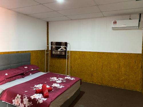 Postel nebo postele na pokoji v ubytování Dalya's Roomstay