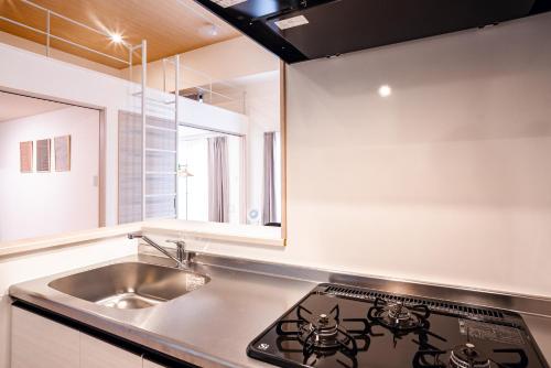 Kuchyň nebo kuchyňský kout v ubytování Hie Apartment