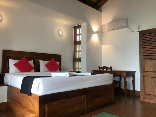 Postel nebo postele na pokoji v ubytování Capital Wind Beach Cabanas