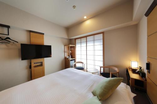 Μια τηλεόραση ή/και κέντρο ψυχαγωγίας στο Hotel Niwa Tokyo