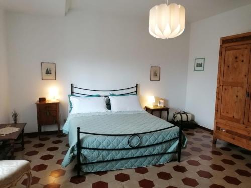 Posteľ alebo postele v izbe v ubytovaní Residenza Le Ortensie