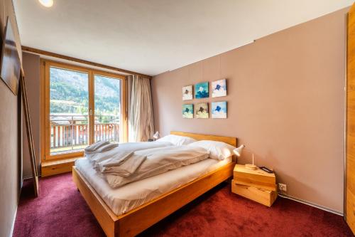 Postel nebo postele na pokoji v ubytování Duplex de charme à Zermatt