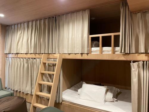 a couple of bunk beds in a room at THE BONDS HOTEL TOKYO in Tokyo