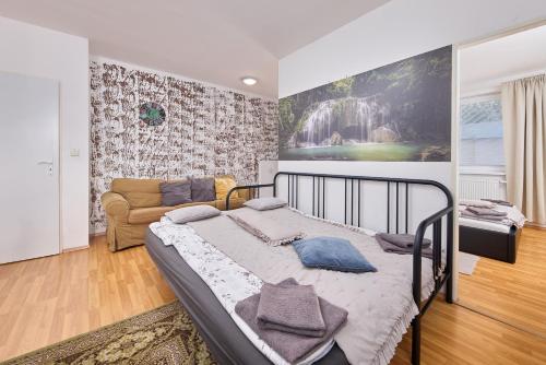 Katil atau katil-katil dalam bilik di Cutie apartment