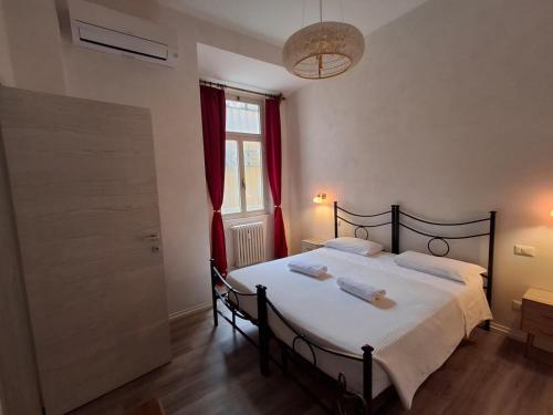 Postel nebo postele na pokoji v ubytování Lighthouse Suites Trastevere