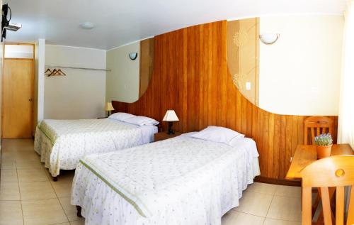 Cama o camas de una habitación en Hospedaje Dulce Estancia