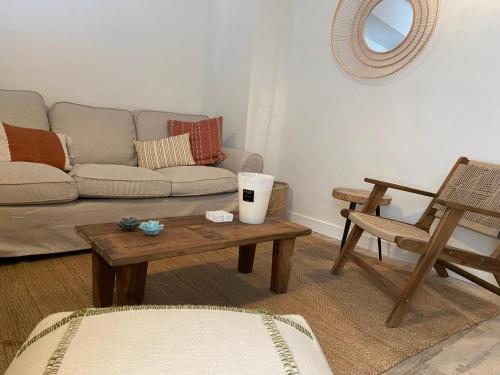 a living room with a couch and a coffee table at Jalon townhouse in Jalón