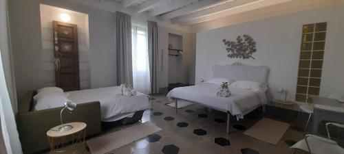 Posteľ alebo postele v izbe v ubytovaní Langhe di Liguria B&B