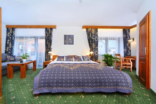 Postel nebo postele na pokoji v ubytování Hotel Friuli