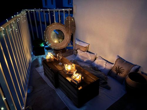 a living room with a couch and a mirror at Casa Basgiu, chambres avec balcon in Zilia