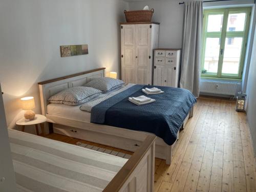 Posteľ alebo postele v izbe v ubytovaní Apartmán č.2