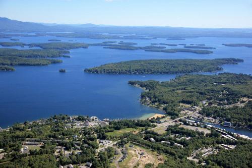an aerial view of a large group of islands in a lake at Half Moon Motel & Cottages in Weirs Beach