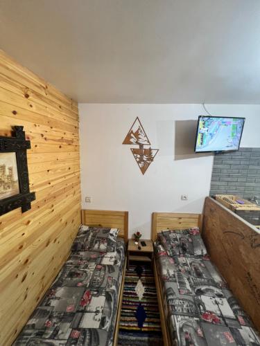 Postel nebo postele na pokoji v ubytování Tikida house
