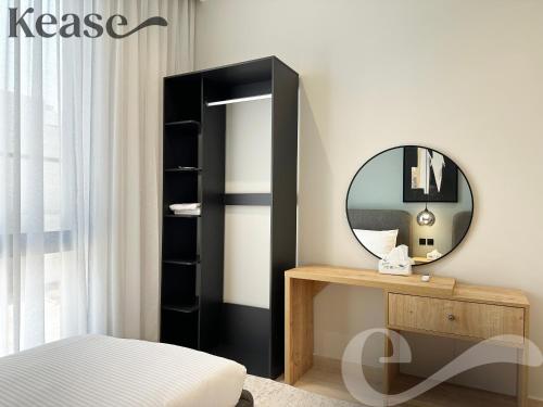 a bedroom with a mirror and a dressing table at Kease Narjis C-8 Royal Touch AG55 in Riyadh