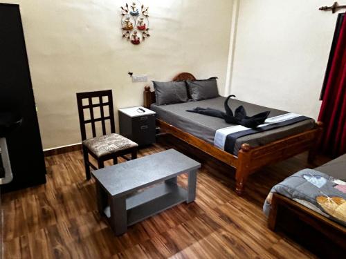 Postel nebo postele na pokoji v ubytování Le'SAP Beach resort