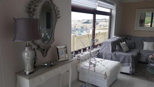 Zona de estar de Seagull Penthouse Marsaxlokk