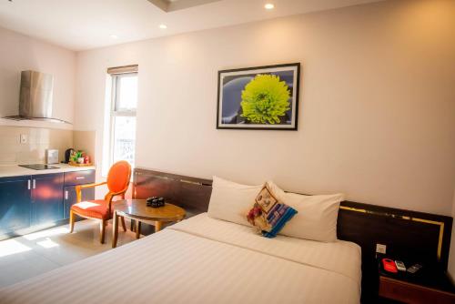 Letto o letti in una camera di Richico Apartments And Hotel
