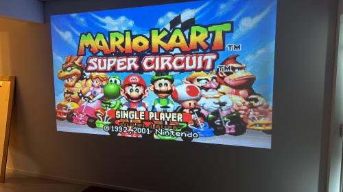 a television screen with a mario kart super citrus fight game at RheinMosel Glück Wellness in Koblenz