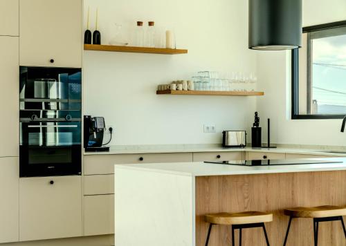 Dapur atau dapur kecil di Oceanfront Retreat in Ribamar
