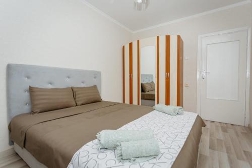 Llit o llits en una habitació de Квартира в центре