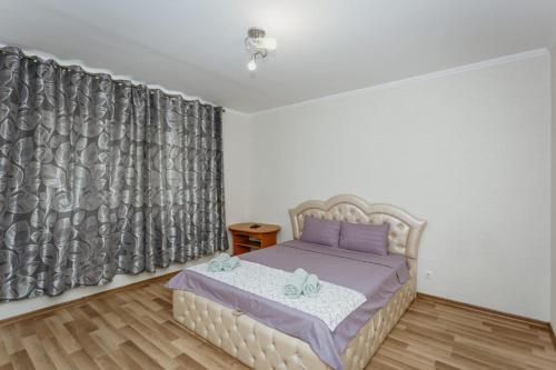 Llit o llits en una habitació de Квартира в центре