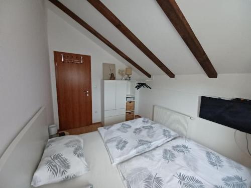 Postel nebo postele na pokoji v ubytování Apartman ZARA - Fužine