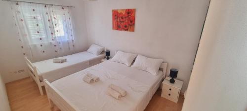 Postel nebo postele na pokoji v ubytování Apartment Sofia
