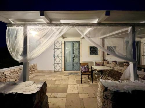 Χώρος καθιστικού στο Trullo Dimora Podere Papilio