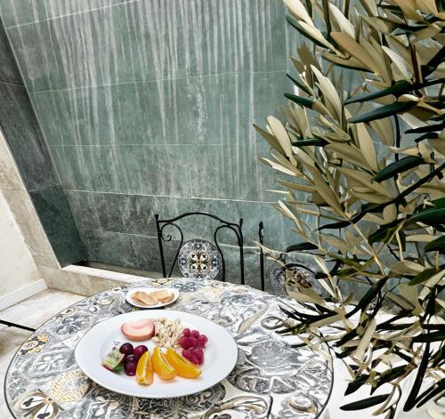 a table with a plate of food on it at Costa by Hawkins Algeciras - Exterior 3B in Algeciras