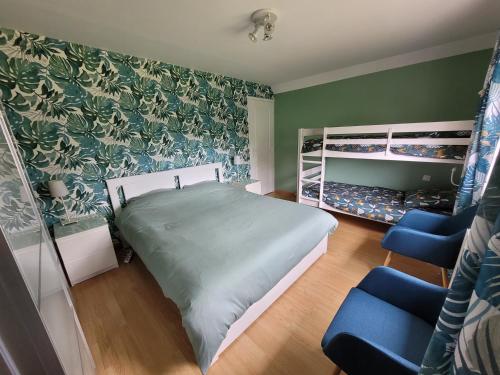 Postel nebo postele na pokoji v ubytování Kernay, grande maison familiale pour 10 personnes