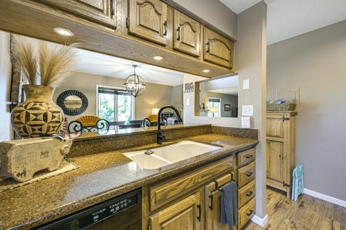 a kitchen with a sink and a large mirror at Hike, Ski and Dine Pagosa Springs Getaway! in Pagosa Springs