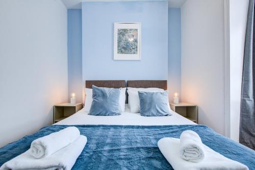 Ένα ή περισσότερα κρεβάτια σε δωμάτιο στο Bath Lodge - Arree Stays