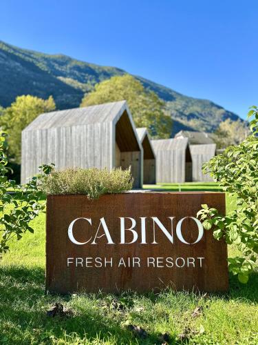 a sign for a fresh air resort in front of a building at Cabino - Fresh Air Resort in Bovec