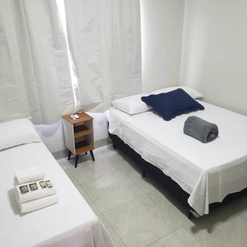 Ένα ή περισσότερα κρεβάτια σε δωμάτιο στο Casa Nova