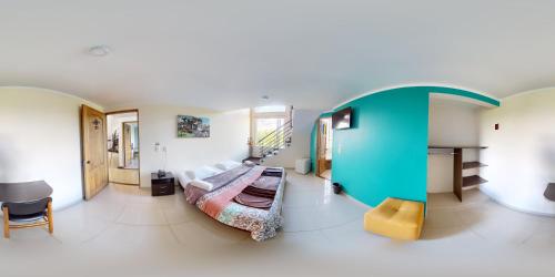 Postel nebo postele na pokoji v ubytování Hotel Villa Colonia