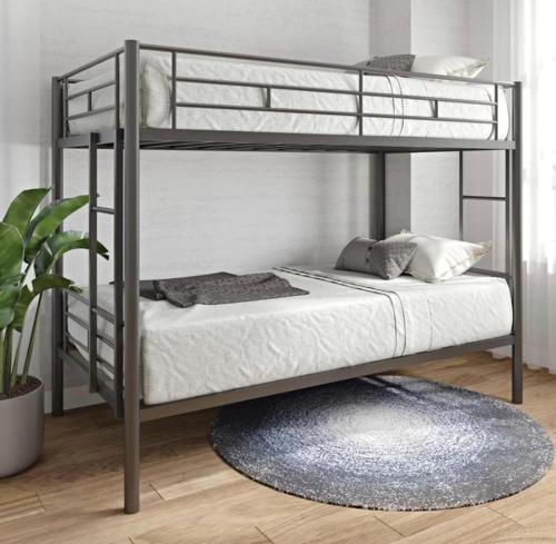 a bedroom with a bunk bed with a rug at Zen in Fort Lauderdale