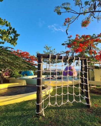 a playground with a volley ball net in a park at Rio Minho Oasis in Dambani