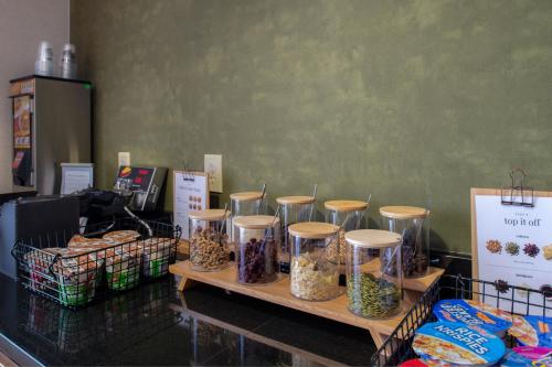 a group of containers of food on a table at Fairfield by Marriott in Troy