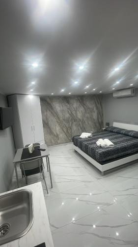 Ένα ή περισσότερα κρεβάτια σε δωμάτιο στο Casa Morimoto