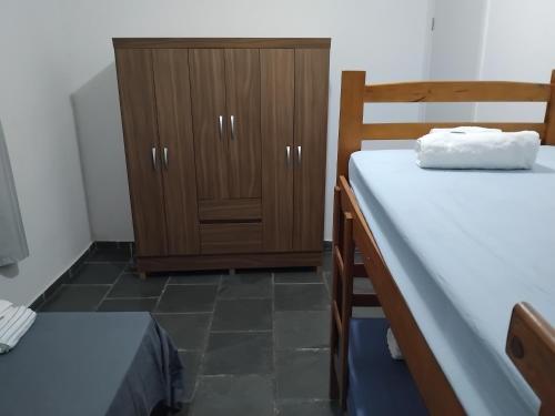 Ένα ή περισσότερα κρεβάτια σε δωμάτιο στο Casa com alojamento, para até 18 pessoas