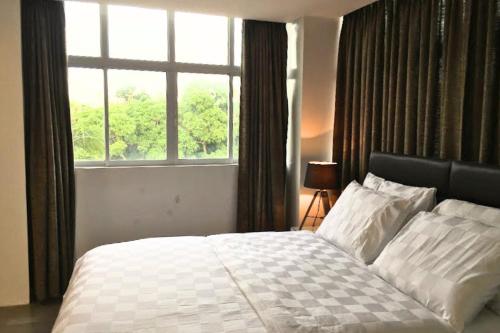 Katil atau katil-katil dalam bilik di Tely's Bed & Breakfast Iloilo powered by Cocotel