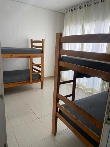Ένα ή περισσότερα κρεβάτια σε δωμάτιο στο Casa com alojamento, para até 18 pessoas