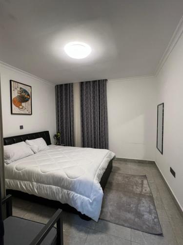 Llit o llits en una habitació de CosyNook 2Bedrooms