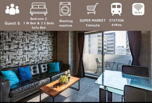 a living room with a couch and a table at RAKU Hotel Tokyo Bay Front in Tokyo