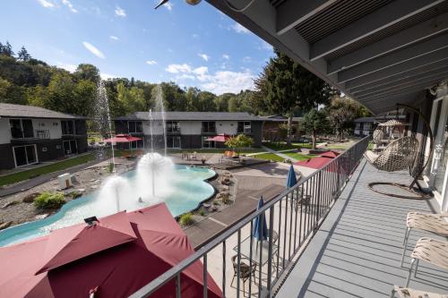 a view of a water park with a fountain at Interurban Suites Hotel in Tukwila