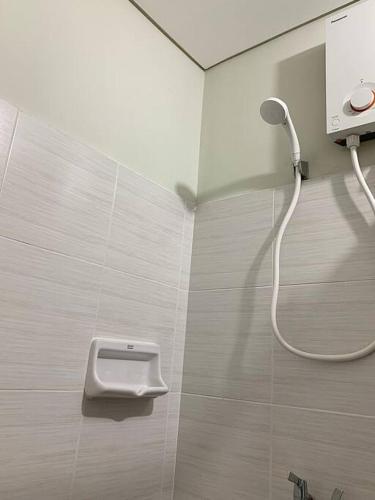 Ванная комната в Affordable Condo, near IT Park
