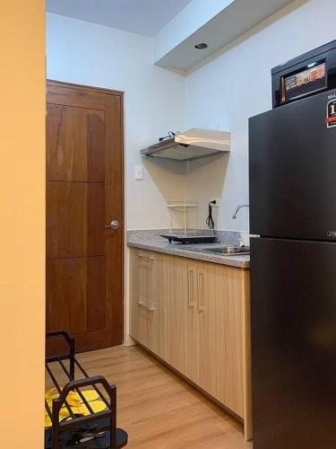 Кухня или мини-кухня в Affordable Condo, near IT Park
